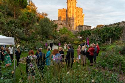 Guests enjoying an evening event in the grounds of Windsor castle